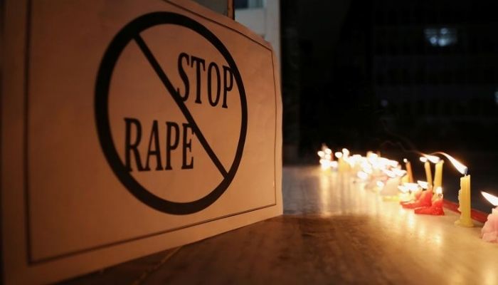 A poster is seen at a candle-lit march by the resident doctors and medical students from All India Institute Of Medical Sciences (AIIMS) to protest against the alleged rape and murder of a 27-year-old woman on the outskirts of Hyderabad, in New Delhi, India, December 3, 2019. — Reuters