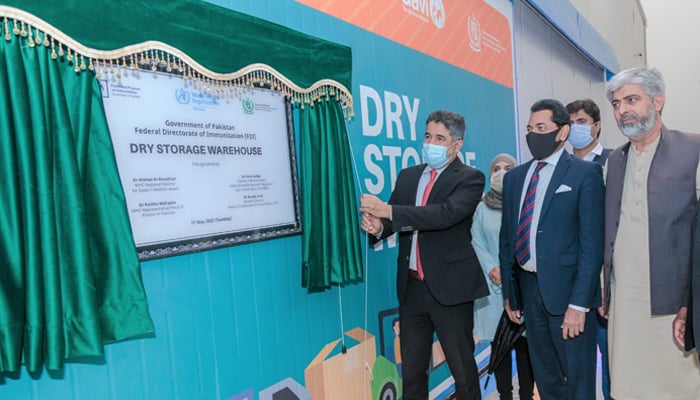 WHO Regional Director Dr Ahmed Al Mandhari (left) inaugurates a dry storage warehouse at the Federal Directorate of Immunization (FDI), on May 21, 2022. — WHO