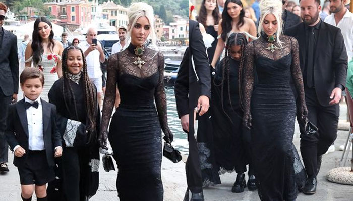 Kim Kardashian channels gothic glam in black gown for Kourtney’s wedding: pics