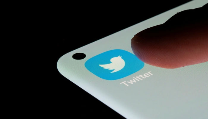 The picture shows Twitter logo on a mobile phone. — Reuters/File