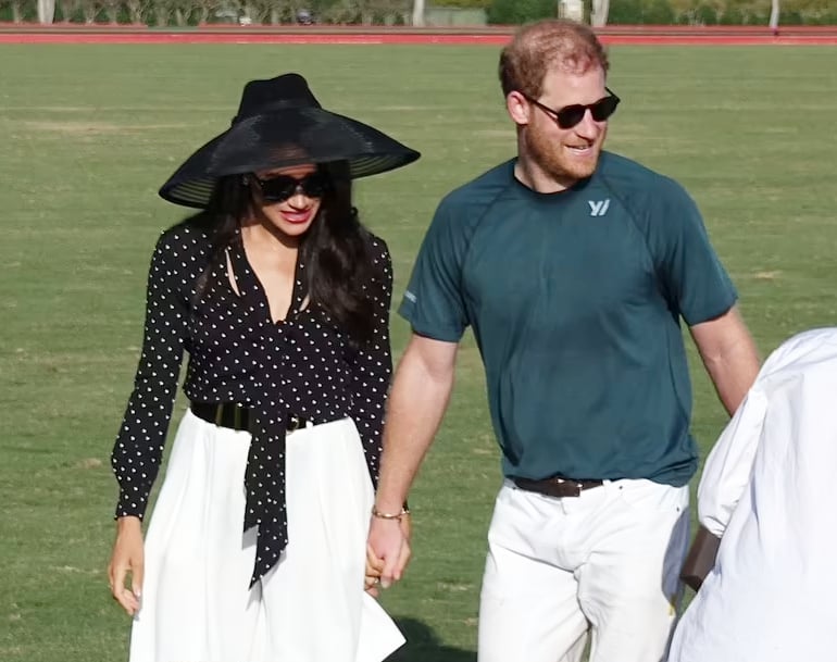 Meghan Markle kisses Prince Harry as crowd cheers them on at polo match: Watch