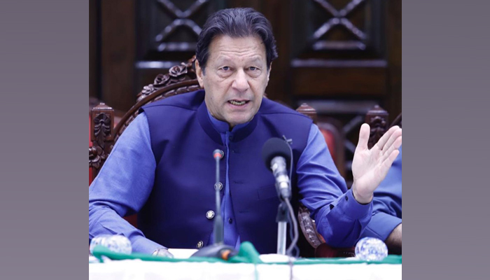 PTI Chairman Imran Khan addresses press conference in Peshawar. — Instagram