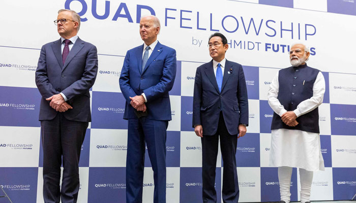 US President Joe Biden (L), Japanese Prime Minister Fumio Kishida and Indian Prime Minister Narendra Modi (R) attend the Japan-US-Australia-India announcing the Quad Fellowship, a scholarship program that will bring together American, Japanese, Australian and Indian masters and doctoral students in science, technology, engineering, and mathematics (STEM) to study in the United States, during the Quad Leaders Summit at Kantei in Tokyo on May 24, 2022. — AFP