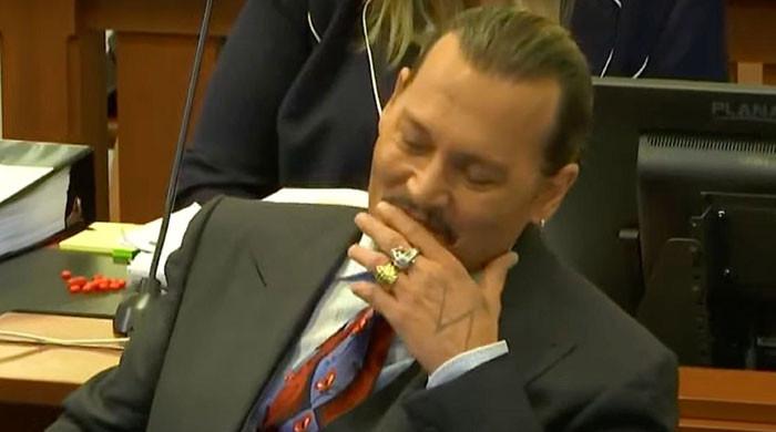 Johnny Depp's security guard breaks into laughter in court, video goes viral