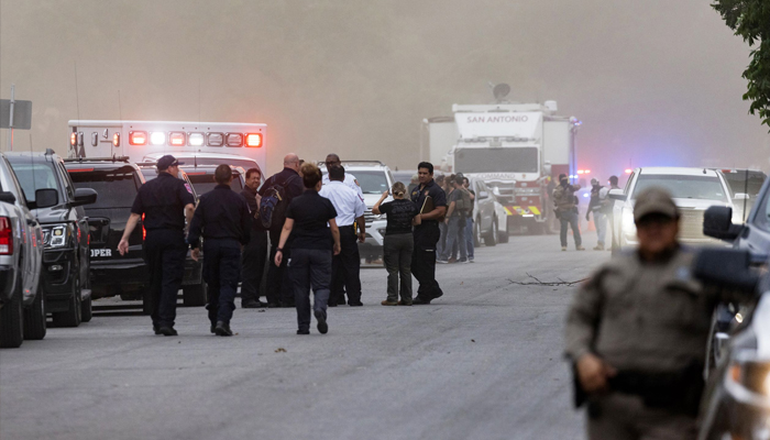 Law enforcement work the scene after a mass shooting at Robb Elementary School in Uvalde, Texas. Photo— Jordan Vonderhaar/Getty Images/AFP