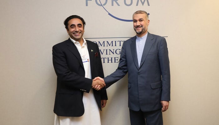 Foreign Minister Bilawal Bhutto-Zardari shakes hands with his Iranian counterpart Dr Hossein Amir Abdollahian on the sidelines of World Economic Forum. — Twitter/Bilawal Bhutto Zardari