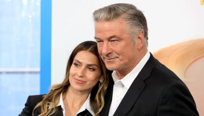 Hilaria Baldwin shares adorable snap of Alec Baldwin cradling her growing baby bump