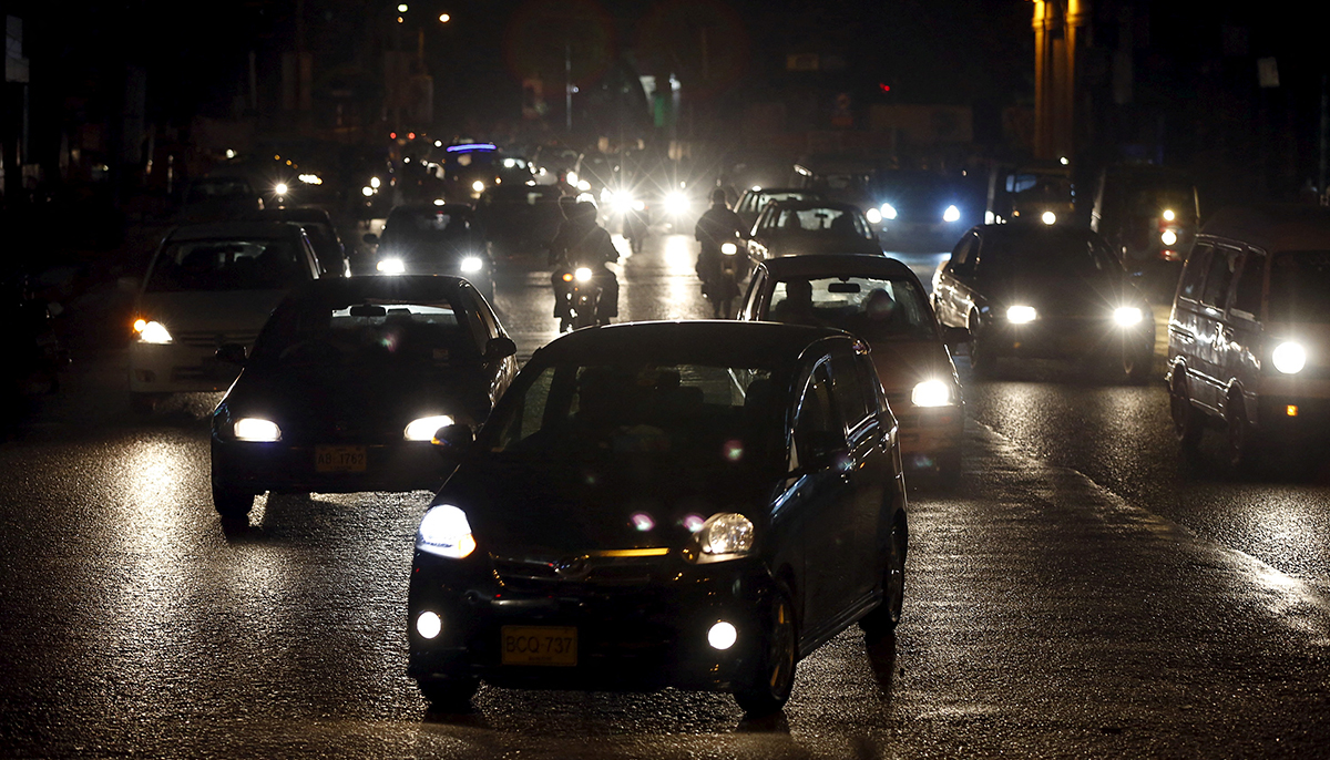 Vehicles move along a road in Karachi, Pakistan, January 15, 2016. — Reuters