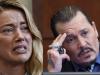 Amber Heard in tears as Johnny Depp wishes 'karma takes gift of breath from her'