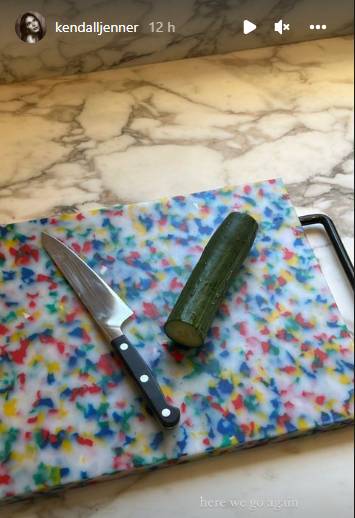 Kendall Jenner chopping a cucumber yet again! Photo