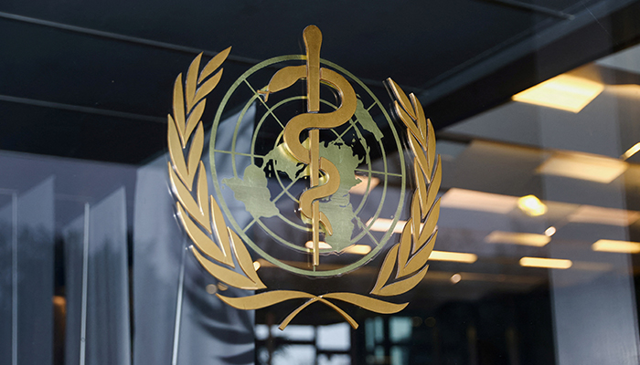 The World Health Organization logo is pictured at the entrance of the WHO building, in Geneva, Switzerland, on December 20, 2021. — Reuters