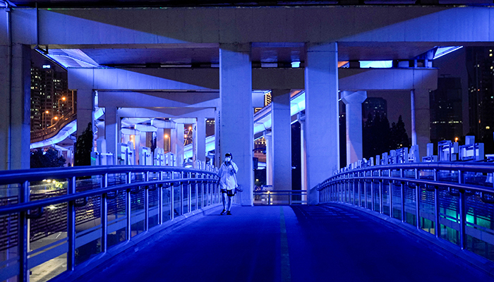 A resident walks on a bridge during a lockdown, amid the coronavirus disease (COVID-19) outbreak, in Shanghai, China, May 27, 2022. — Reuters