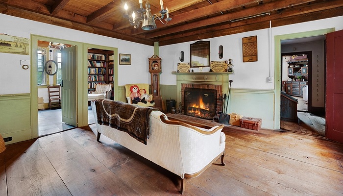 The living room of “The Conjuring” house. —Blueflash Photography/Mott & Chace/Sotheby’s International Realty