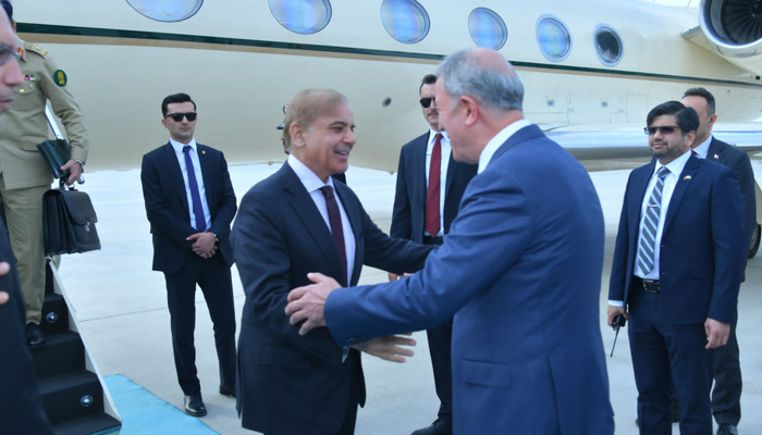 Turkish Defence Minister Hulusi (right) receives Prime Minister Shehbaz Sharif at Ankara Esenboğa Airport in Turkey, on May 31, 2022. — PM Office