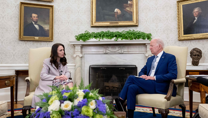 US President Joe Biden (R) meets with Prime Minister Jacinda Ardern, of New Zealand, in the Oval Office of the White House in Washington, DC, on May 31, 2022. Photo —SAUL LOEB / AFP