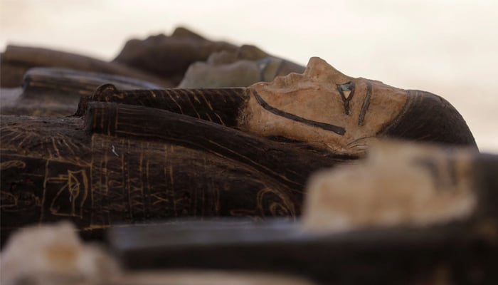 Sarcophaguses that are around 2500 years old, from the newly discovered burial site near Egypts Saqqara necropolis, are seen during a presentation in Giza, Egypt May 30, 2022. Photo—REUTERS/Mohamed Abd El Ghany