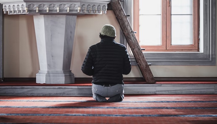 Representational image of a Muslim man worshipping and praying afternoon in a mosque on Friday.—Unsplash/Imad Alassiry