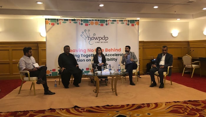 A panel discussion exchanges views on problems thatpersons with disabilities face in Karachi, on June 1, 20222. —NOWPDP