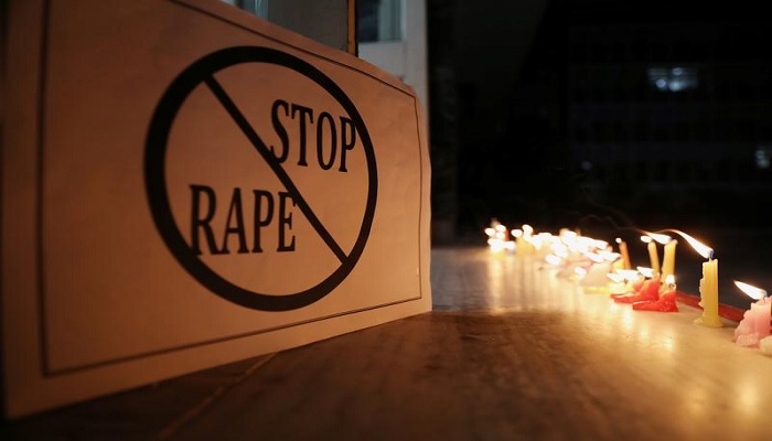 A poster is seen at a candle-lit march by the resident doctors and medical students from All India Institute Of Medical Sciences (AIIMS) to protest against the alleged rape and murder of a 27-year-old woman on the outskirts of Hyderabad, in New Delhi, India, December 3, 2019. — Reuters