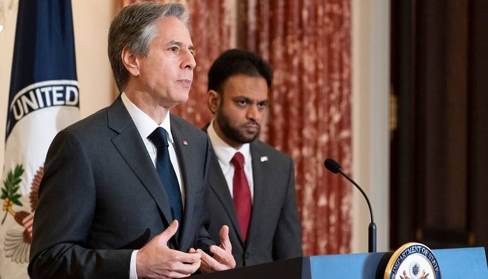 Secretary of State Antony Blinken, left, speaks on the release of the 2021 International Religious Freedom Report, accompanied by Ambassador at Large for International Religious Freedom Rashad Hussain, at the State Department. — AP