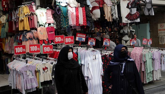 People stroll at Mahmutpasa street, a middle-class shopping area, in Istanbul, Turkey May 6, 2022. — Reuters/File