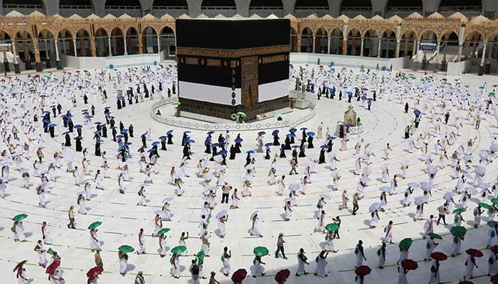 A picture taken on July 29, 2020 shows pilgrims circumambulating around the Kaaba at the centre of the Grand Mosque in the holy city of Makkah at the start of the annual Muslim Hajj pilgrimage. — AFP/File