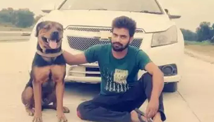 The picture shows dog along with ownerVishal Srivastava. — Times of India