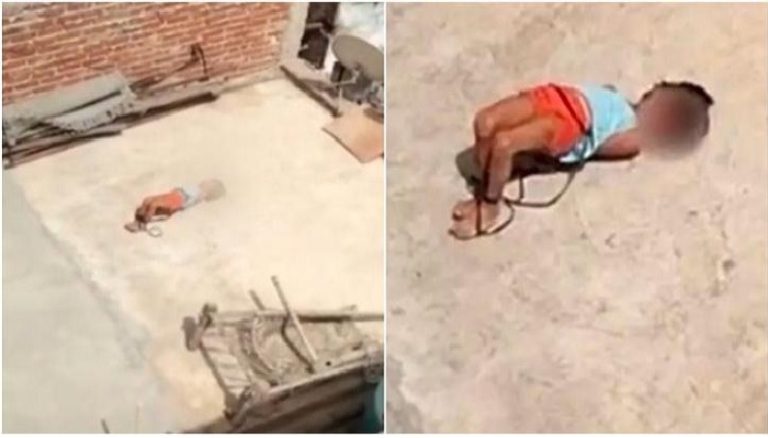 A video of a five-year-old child tied with a rope and left alone on the terrace under the blazing sun went viral.—Screengrab via Instagram/The Economic Times