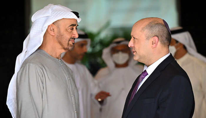 A handout picture obtained from the Israeli Government Press Office (GPO) on June 9, 2022, shows UAEs President Sheikh Mohammed bin Zayed al-Nahyan (L) receiving Israels Prime Minister Naftali Bennett during a snap visit, in Abu Dhabi. — AFP/GPO