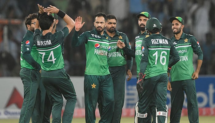 Pakistans Mohammad Nawaz (C) celebrates with teammates after taking the wicket of West Indies Brandon King (not pictured) during the second one-day international (ODI) cricket match between Pakistan and West Indies at the Multan Cricket Stadium in Multan on June 10, 2022. — AFP