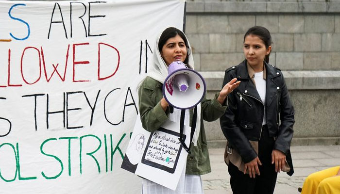 Nobel peace prize winner Malala Yousafzai speaks during a Fridays For Future protest, in Stockholm, Sweden, June 10, 2022. Photo— REUTERS/Philip OConnor