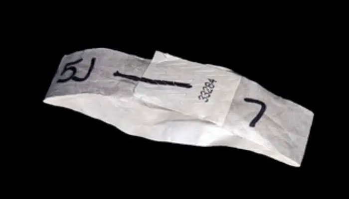 Larry Formans wrist band. (Picture credits: Insider)