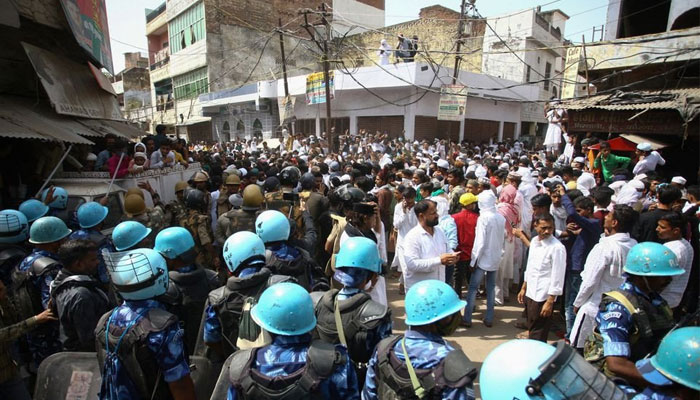 Protestors clash with police during a protest demanding the arrest of Bharatiya Janata Party (BJP) member Nupur Sharma for her comments on Prophet Mohammed (PBUH), in Prayagraj, India, June 10, 2022. — Reuters