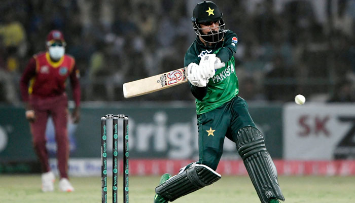 Shadab Khan plays a shot during the third and final one-day international (ODI) cricket match between Pakistan and West Indies at the Multan International Cricket Stadium in Multan on June 12, 2022. — AFP
