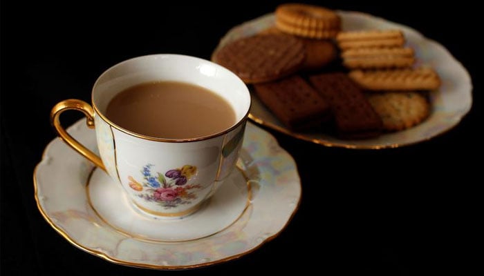 A cup of tea and plate of biscuits seen in the picture. — Reuters/File