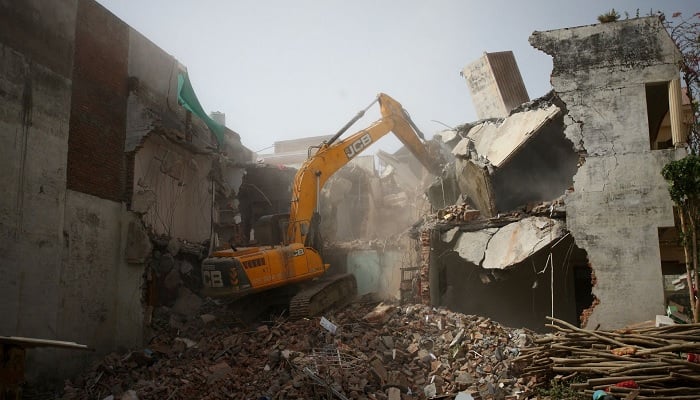 Indian officials step up arrests, demolish houses to stop unrest over anti-Islam remarks. — Reuters