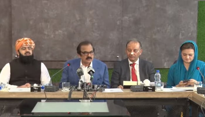 Interior Minister Rana Sanullah (centre) addresses a press briefing alongside other federal ministers in Islamabad, on June 14, 2022. — YouTube/PTV
