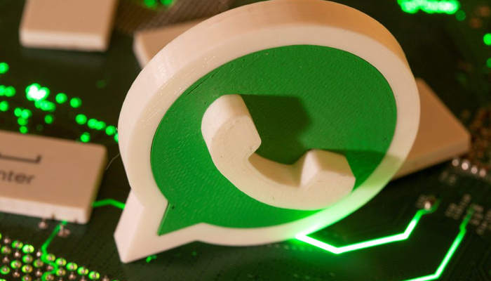 A 3D printed Whatsapp logo and keyboard buttons are placed on a computer motherboard in this illustration taken January 21, 2021. — Reuters