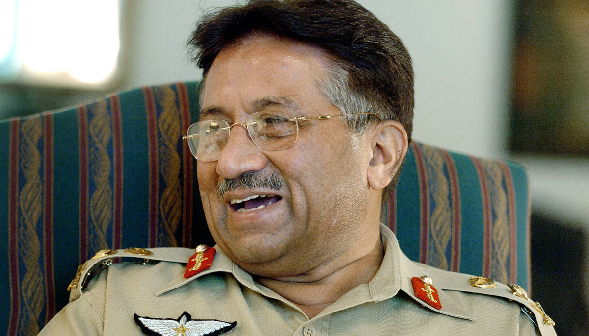In this photo taken on June 12, 2004, Musharraf laughs while responding to a question during an interview in Rawalpindi. — AFP