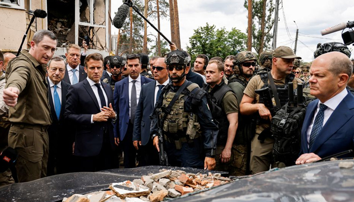 Frances President Emmanuel Macron, Italian Prime Minister Mario Draghi, German Chancellor Olaf Scholz and Romanian President Klaus Iohannis visit Irpin, Ukraine June 16, 2022. — Reuters
