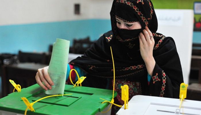 Woman casting her vote during 2018 General Elections — AFP