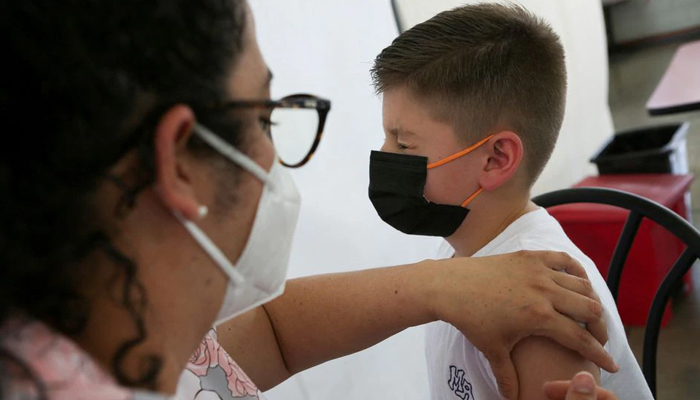 A child is administered a dose of the Pfizer-BioNTech coronavirus disease (COVID-19) pediatric vaccine, in San Jose, Costa Rica February 23, 2022. — Reuters