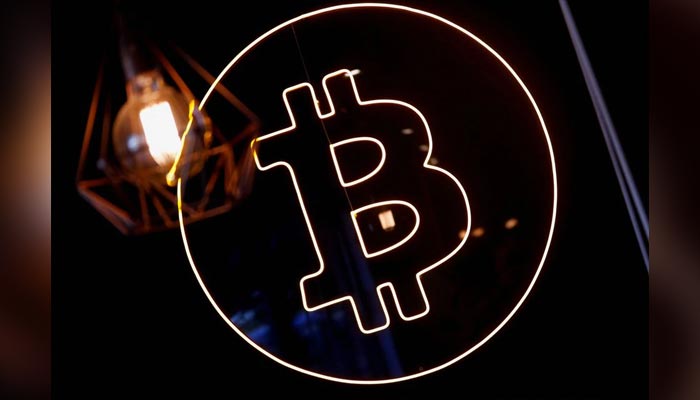 A neon logo of the cryptocurrency Bitcoin is seen at the Crypstation cafe, in downtown Buenos Aires, Argentina May 5, 2022. The picture was taken on May 5, 2022. — Reuters/File