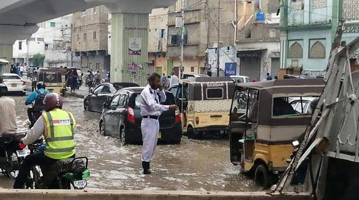 Karachi traffic police launch 'free vehicle repairing service' for monsoon rains