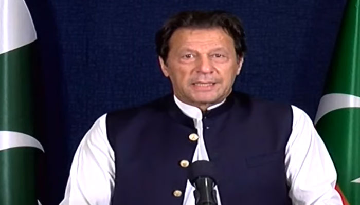 PTI Chairman Imran Khan addressing party workers via video link. — Screengrab/Geo News