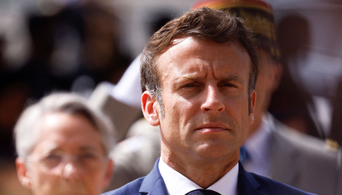 French President Emmanuel Macron attends a ceremony marking the 82nd anniversary of late French General Charles de Gaulles resistance call of June 18, 1940, at the Mont Valerien memorial in Suresnes near Paris, France, June 18, 2022. Photo — GONZALO FUENTES / POOL / AFP