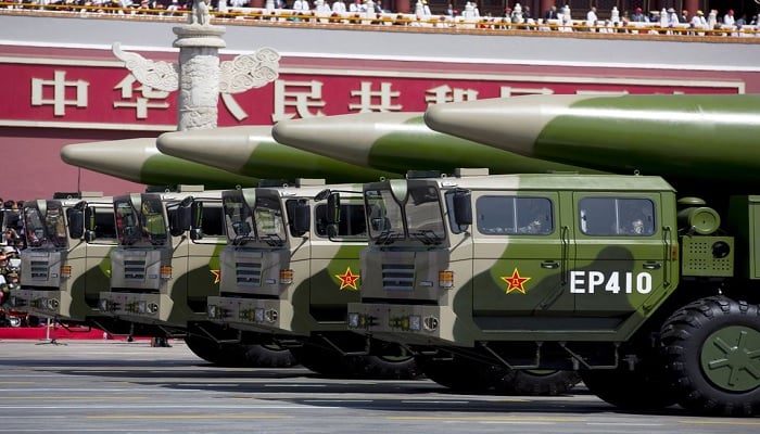 Military vehicles carrying DF-26 ballistic missiles travel past Tiananmen Gate during a military parade to commemorate the 70th anniversary of the end of World War II in Beijing Thursday Sept. 3, 2015.—Reuters