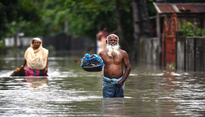 More than 100,000 villagers are taking refuge in relief shelters in Assam.— Biju BORO AFP