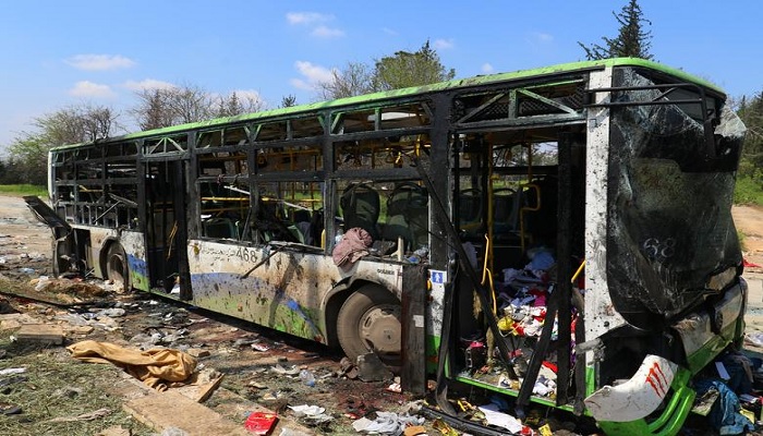 A damaged bus is seen after an explosion yesterday at insurgent-held al-Rashideen, Aleppo province, Syria April 16, 2017. — Reuters