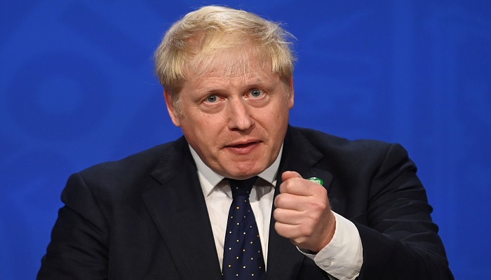 Britains Prime Minister Boris Johnson gestures as he speaks during a news conference with Britains Chancellor of the Exchequer Rishi Sunak and Britains Health Secretary Sajid Javid (not pictured) in Downing Street, in London, Britain, September 7, 2021.—Reuters